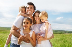 Happy young family with three children